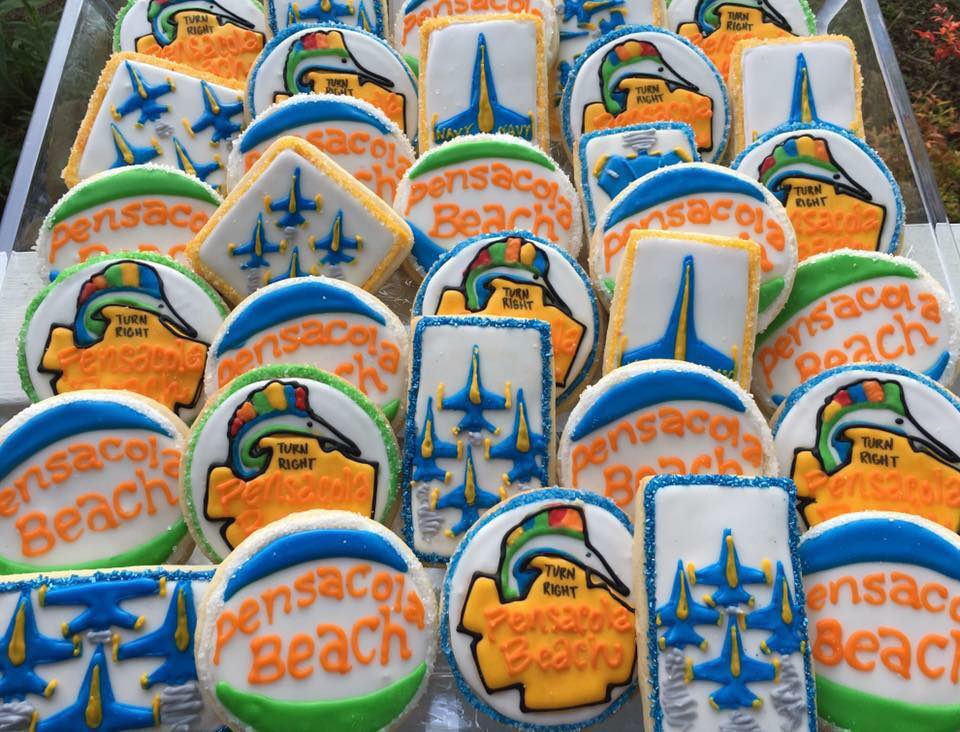 Decorated sugar cookies featuring the Pensacola Beach sign and beach ball water tower | Annie's Naked Cookies at Palafox Market