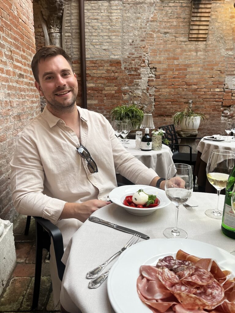 Outdoor courtyard dining experience at Regina Corner in Venice Italy | Experiential gifts for men