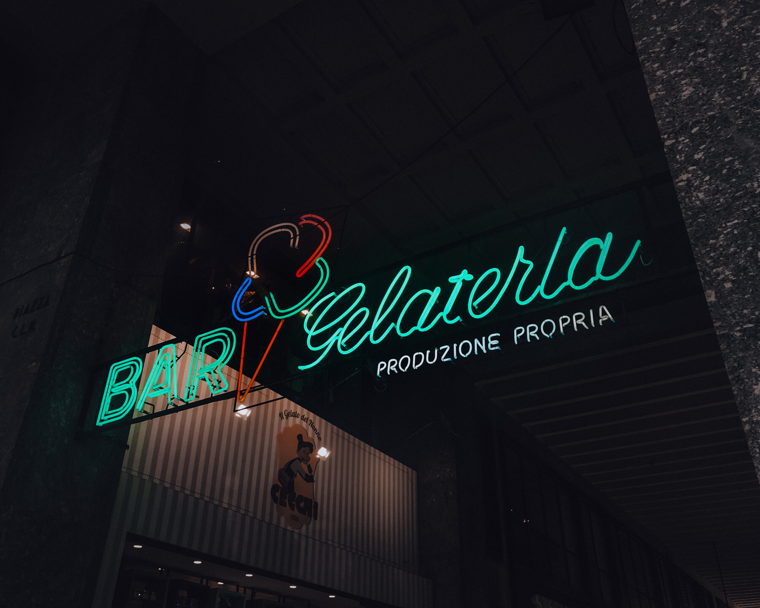 Neon Gelato shop sign in Italy reads Bar Gelateria