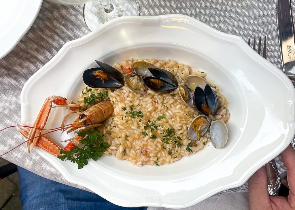 Clam and seafood risotto at Regina Corner in Venice Italy