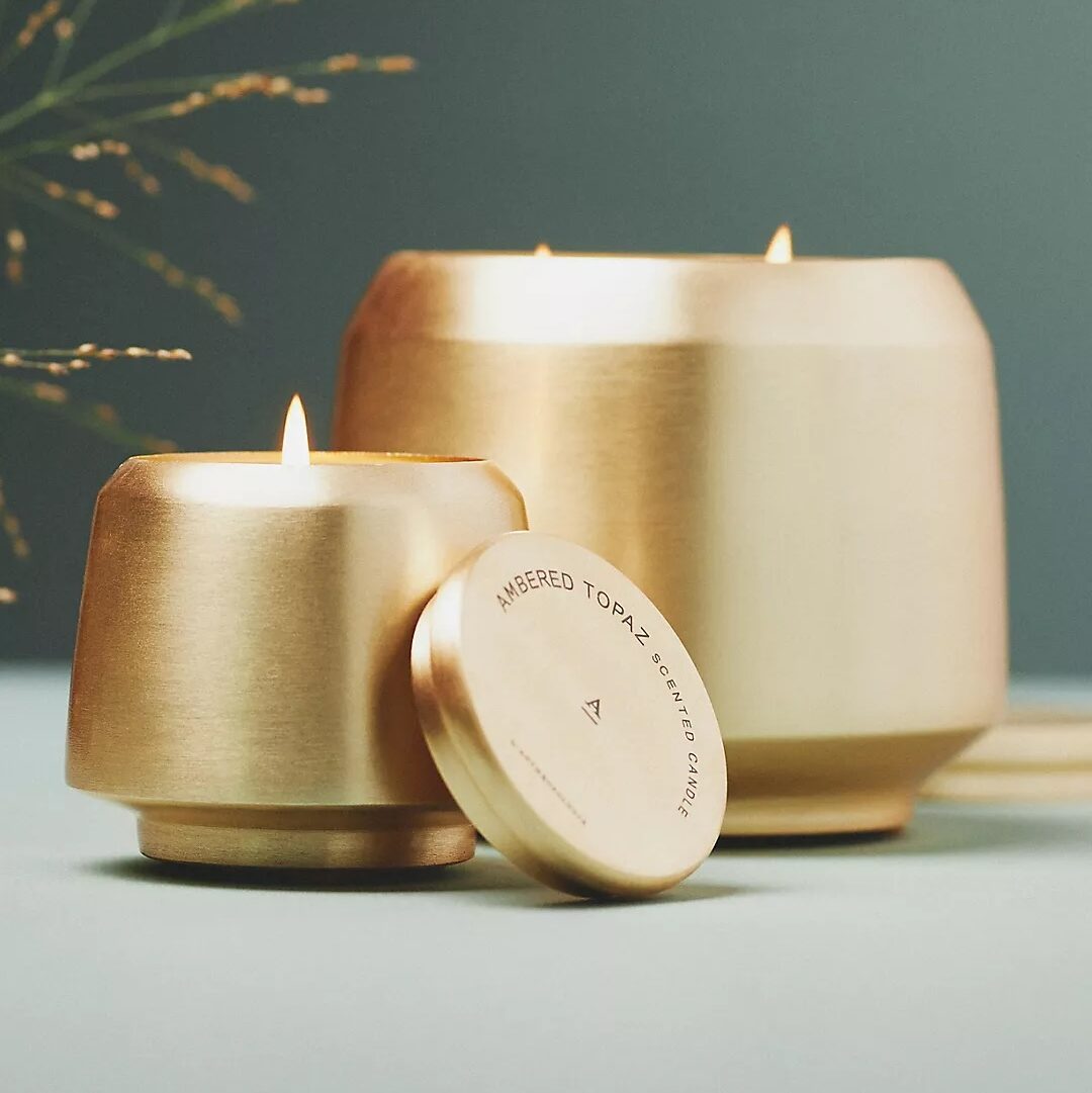 Single wick and double wick gold gathered candle by Anthropologie